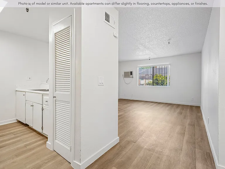Spacious interior with modern flooring, clean finishes, and a functional open layout.