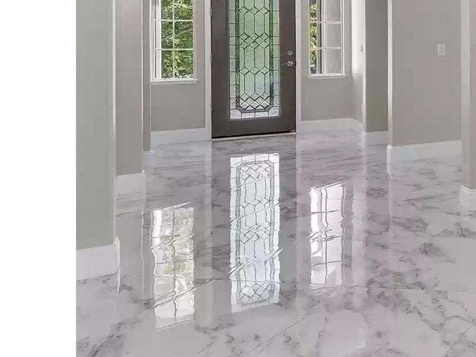 Walk into this beautiful entry with marble floors and glass front door