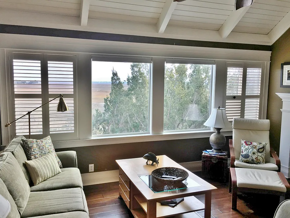 Great room windows and light, overlooking the marsh toward Sea Island to the east.