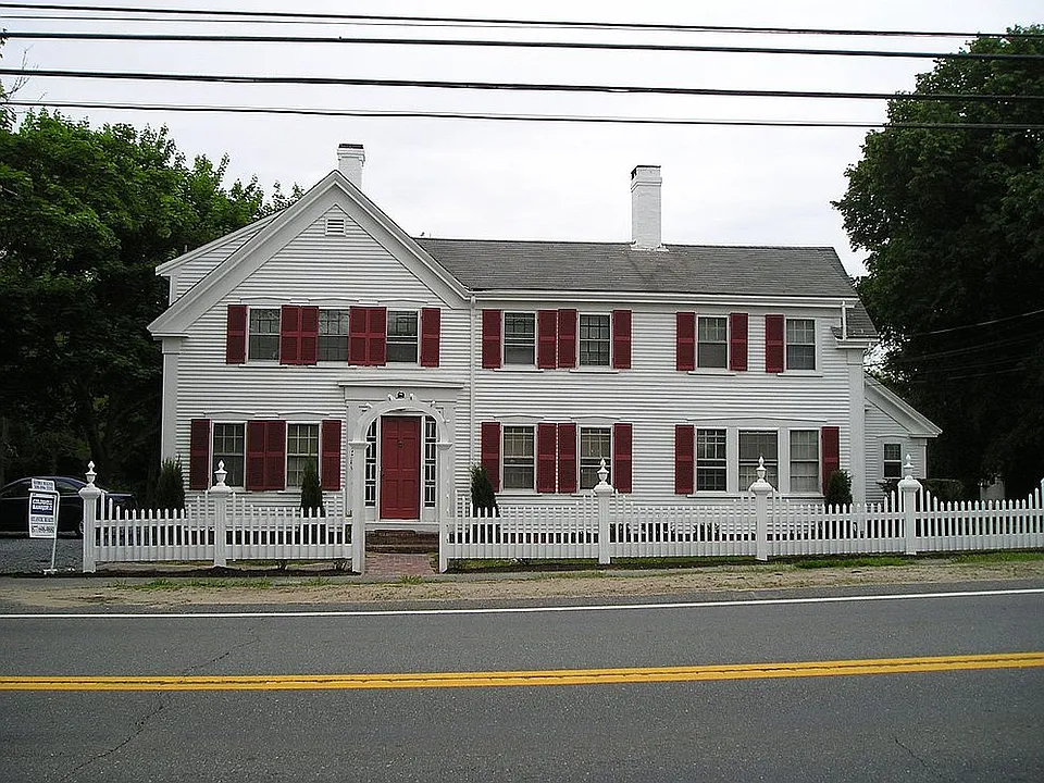 Front view of 3 family Antique Colonial