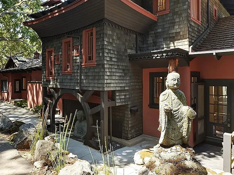 "...a little god of rice and plenty sits on a ledge by the front door"--Description of The House in Sunset Magzine 1918