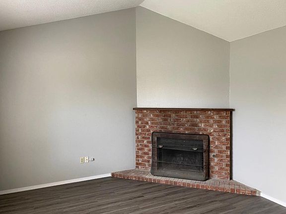 Living room with fireplace (view from front door entry).