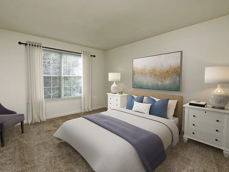 Bedroom with carpeted flooring