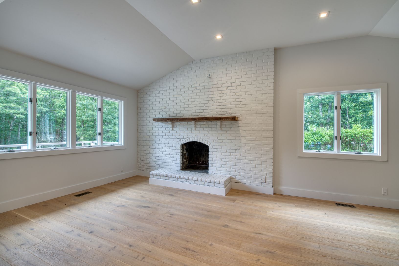  Family Room w Wood Burning Fireplace