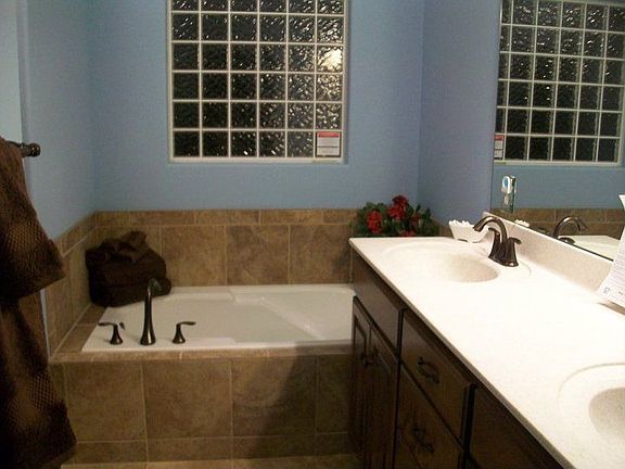 Master Bath has double vanity and soaking tub