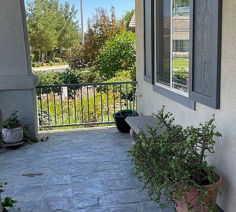 Front porch on a beautiful street.