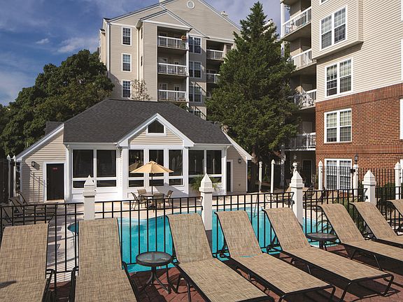 Sparkling Pool & Sundeck with Relaxing Lounge Chairs