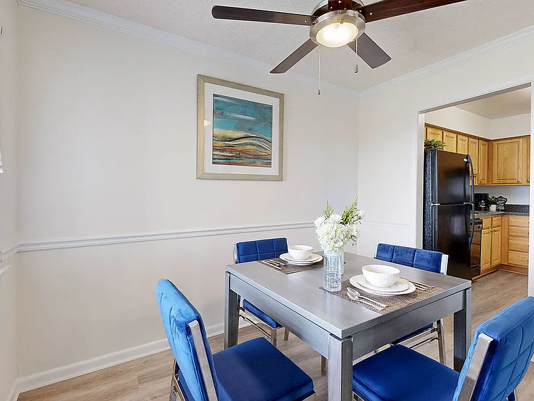 Dining area with hardwood-style flooring