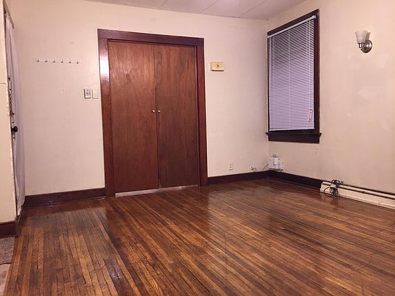 Living room looking at bedroom doors closed