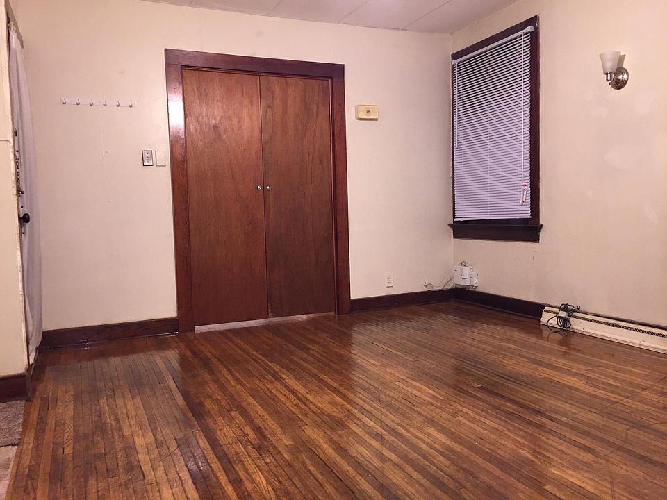 Living room looking at bedroom doors closed