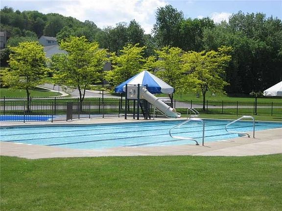 Enjoy the community amenities that include a pool, community center, playground and a softball/baseball field.