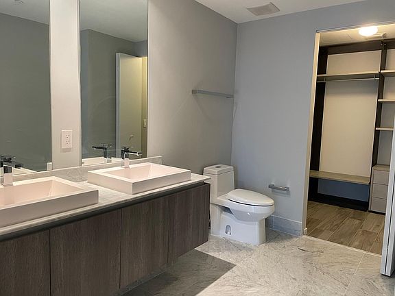 Master bathroom with huge walk-in closet