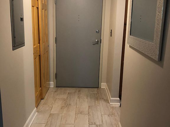 Entrance to the apartment. Big closet. Tiles on the floor
