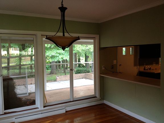 Dining room looking out to screened in porch