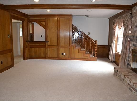 Den with New Carpet.