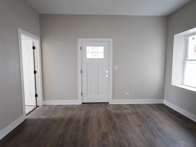 Bedroom #1 - the primary bedroom has a walk-in closet, bathroom and access to the deck