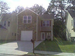 Home backs up to private wooded area.