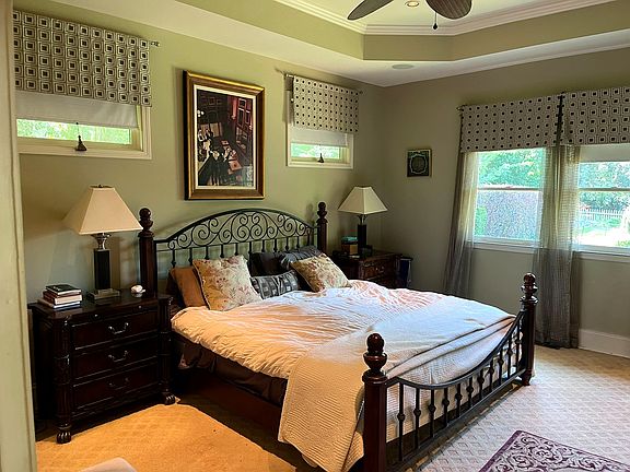 Master bedroom with tray ceiling. Sonos Speakers in ceiling.