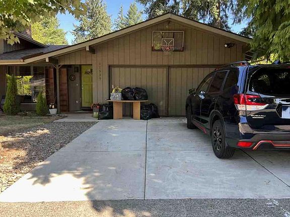 Two-car garage with ample driveway parking