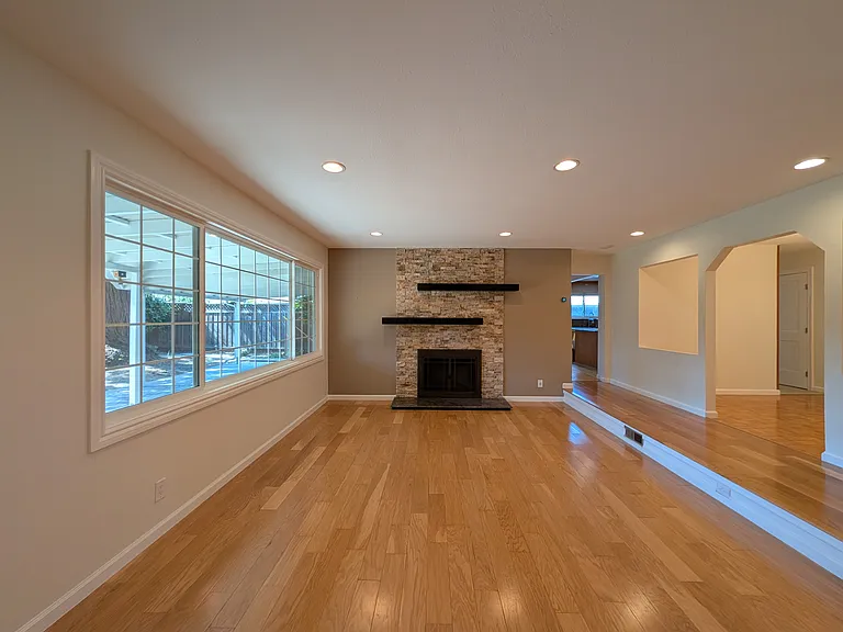 Living room facing the fireplace.