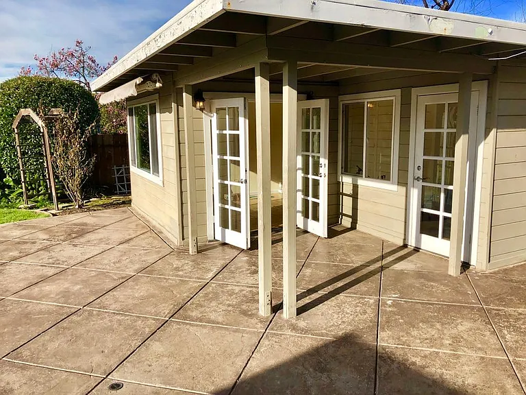 Separate home office with french doors