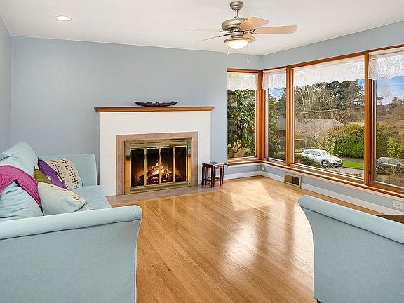 Living room with big windows, western facing for plenty of