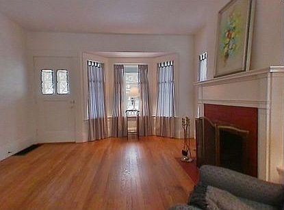Cozy living room with WBFP view from dining room     