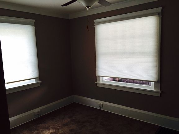 Front facing bedroom #1 with large closet and two laege pict