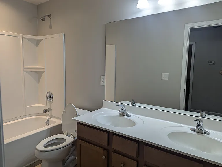 Upstairs shared bathroom. Jack-n-Jill sinks