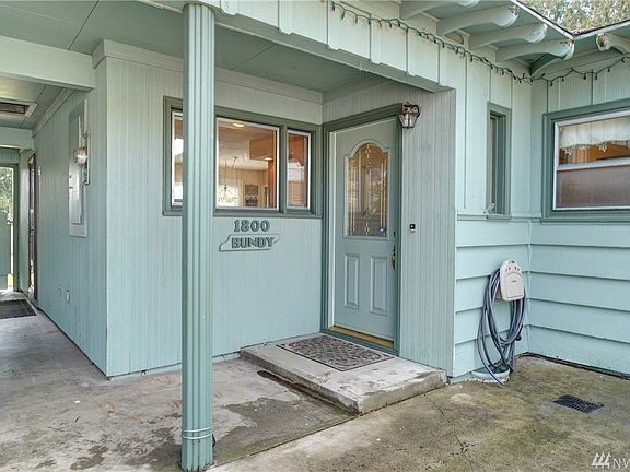 Greet your guests under the delightful covered porch.