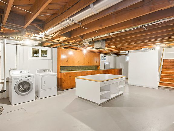 the basement is huge and 2 addtional rooms for crafts, home office, music etc. Tons of storage in this house built ins on all floors