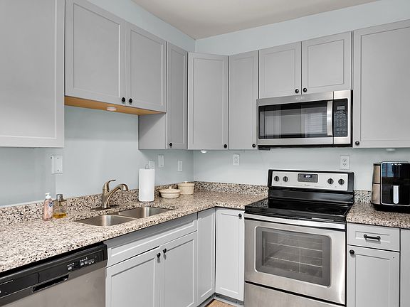 Fully stocked kitchen with modern appliances _ ready for long-term stays.