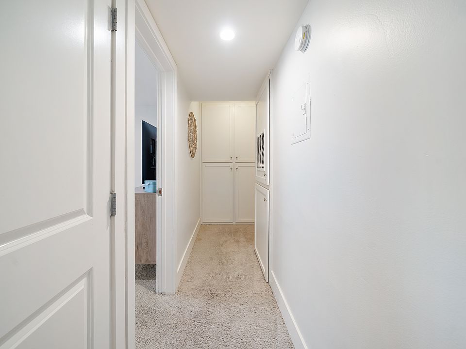 Hall with linen cabinets