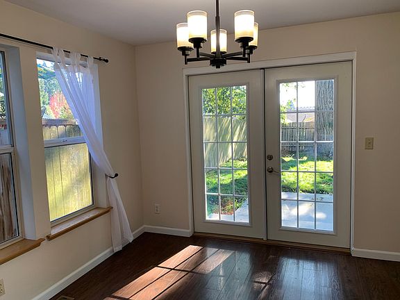 Beautiful French Doors out to cemet patio and fully fenced yard.