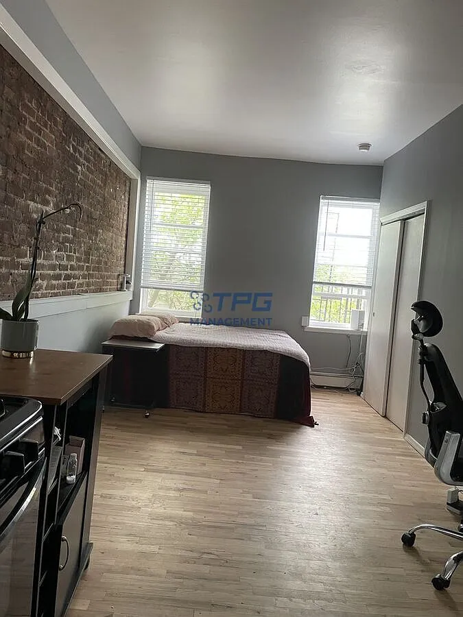 Bright Studio-Style 1BR with Exposed Brick | Jersey City | $1,550 — Photo 1