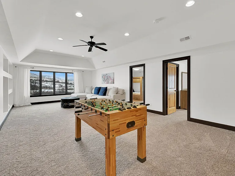 Upstairs living space-
Two bedrooms, full bath, tv and games