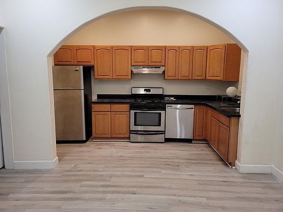Kitchen in back of unit.