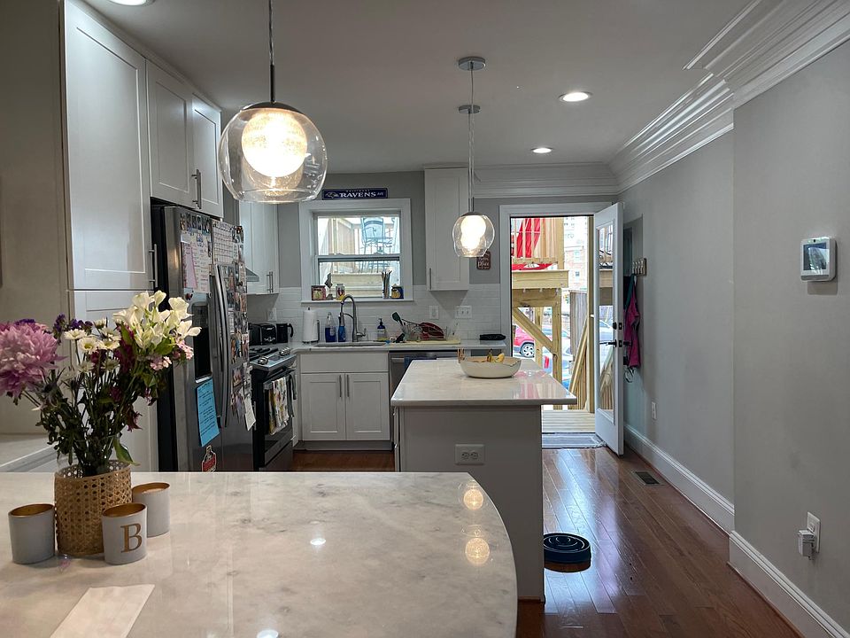 spacious Kitchen leads to car pad and oversized deck!!!!