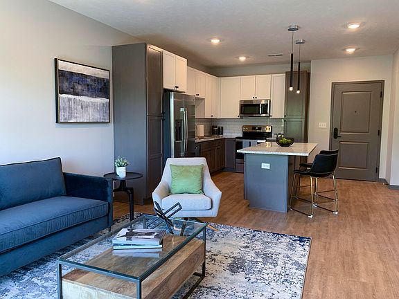 Open-concept living spaces combine modern kitchens with cozy lounge areas, creating the perfect home for relaxation and connection.