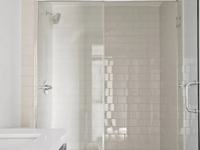 Bathroom with Walk-In Shower & Glass Door, and Vanity Cabinet Storage
