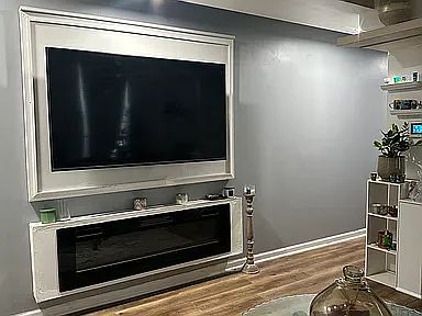 Wall mount TV with functioning fireplace