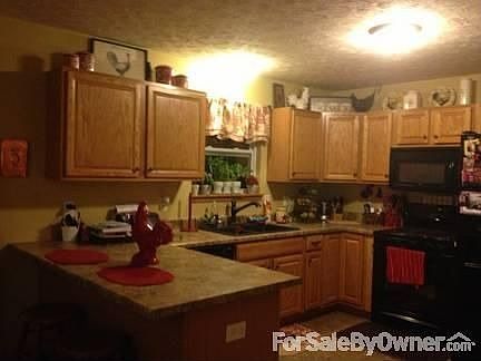 Kitchen
						:
						Large eat in kitchen with breakfast bar and pantry