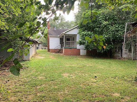 Large Back Yard requires Lawn mower or Lawn Maintenance Service