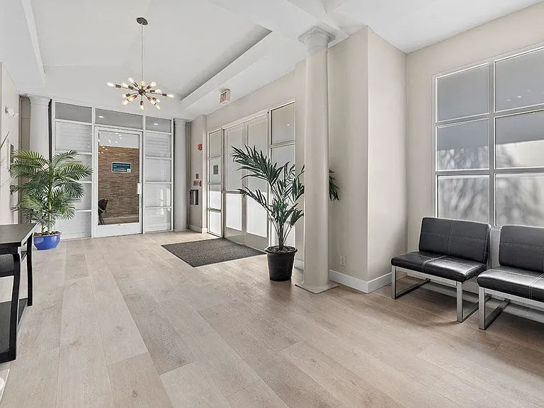 Stylish modern lobby at Palms Court Apartments