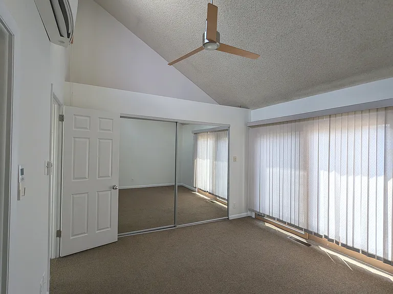 Back bedroom - Closet w/mirror doors
Not shown - Walkout balcony