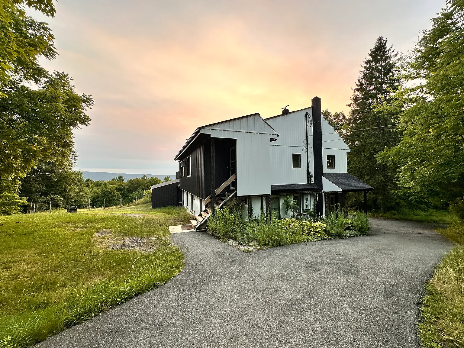 Side entrance of house to apartment. Completely private with private parking.