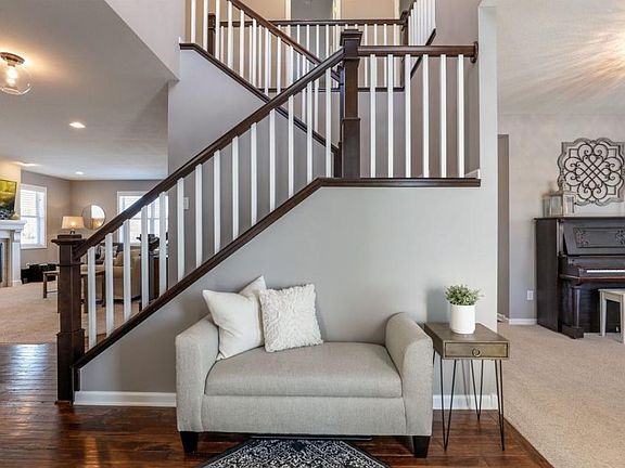 Welcome home  to this Grand 2 story foyer with open staircase!