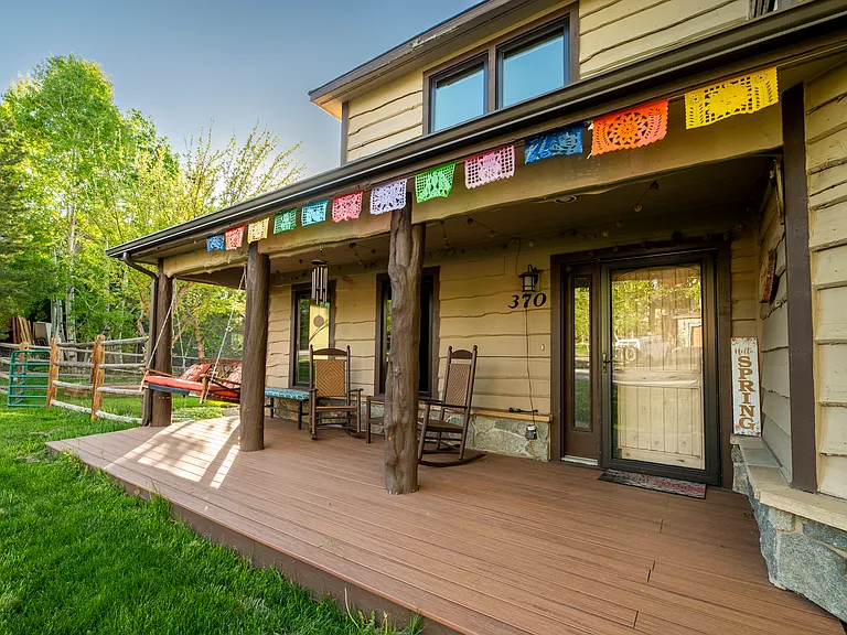 Great covered patio providing shade all summer, keeping the house nice and cool.
