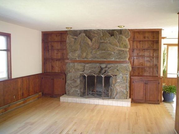living room w/ wood fireplace