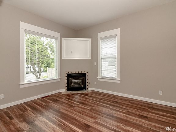 Formal living room with a gas fireplace. 